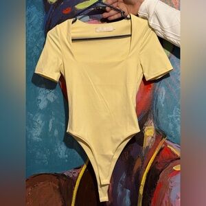 Lizette collection yellow bodysuit
